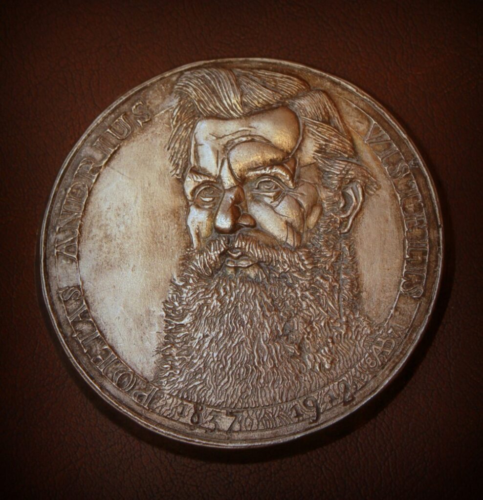 Medalis „Poetas Andrius Vištelis“. Skulptorius Algirdas Bosas. 1987 m.